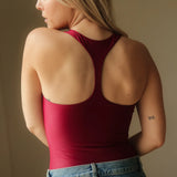 Magnolia Bodysuit Wine. Body deportivo sostenible mujer